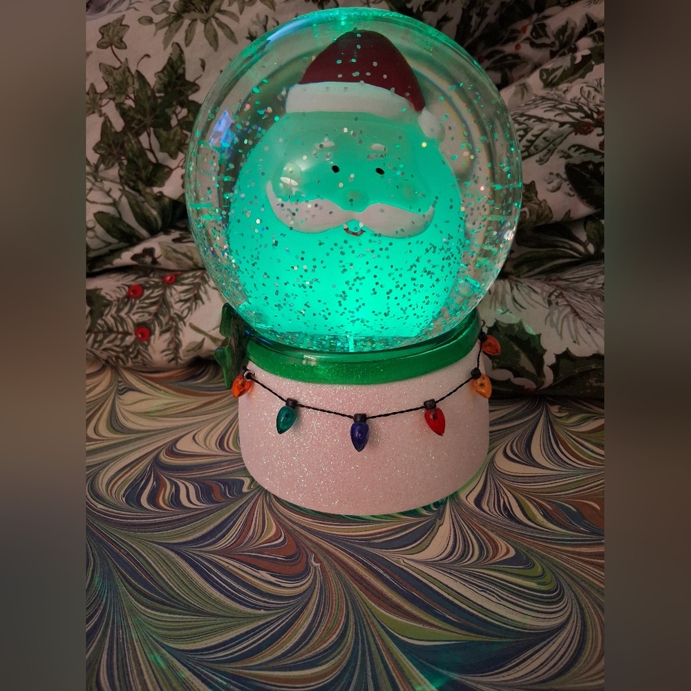 Light-Up Bobble Head Santa Snow Globe New He Moves.